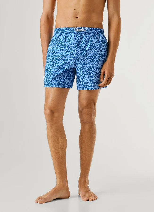 Badeshorts mit durchgehendem Monogramm Badeshorts mit durchgehendem Monogramm
