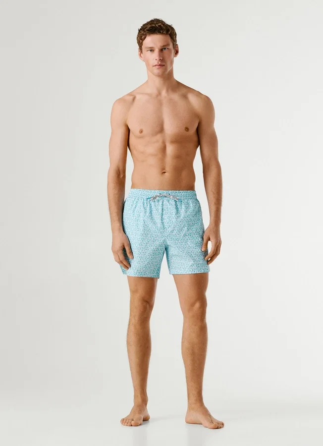 Badeshorts mit durchgehendem Monogramm Badeshorts mit durchgehendem Monogramm
