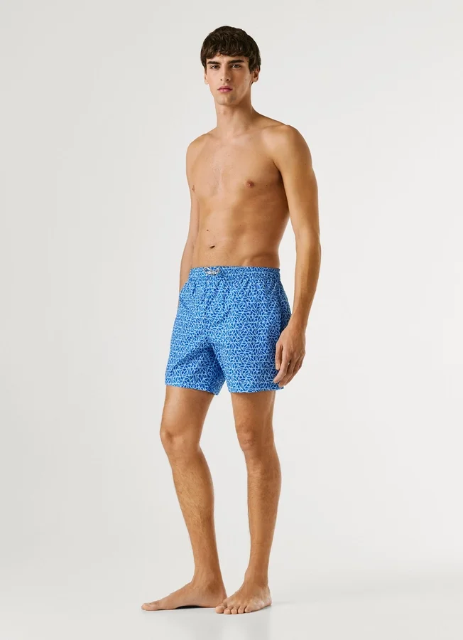 Badeshorts mit durchgehendem Monogramm Badeshorts mit durchgehendem Monogramm
