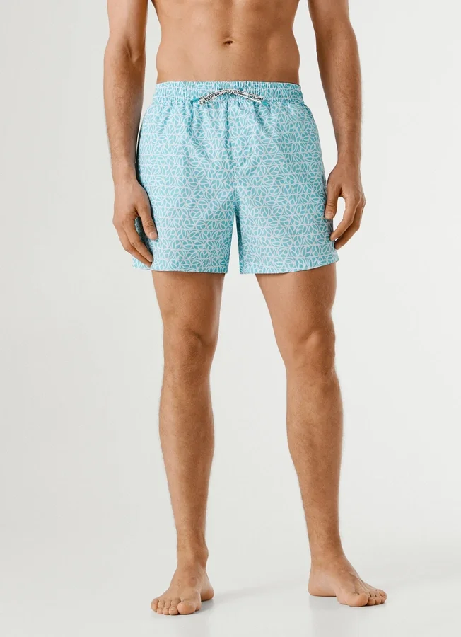 Badeshorts mit durchgehendem Monogramm Badeshorts mit durchgehendem Monogramm