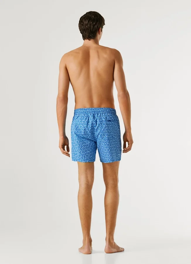 Badeshorts mit durchgehendem Monogramm Badeshorts mit durchgehendem Monogramm