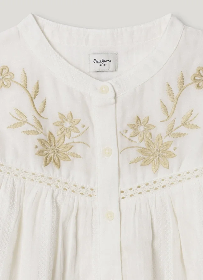 Bluse mit Stickdetails Bluse mit Stickdetails