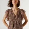 Bluse mit V-Ausschnitt und Rüschen Bluse mit V-Ausschnitt und Rüschen
