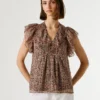 Bluse mit V-Ausschnitt und Rüschen Bluse mit V-Ausschnitt und Rüschen