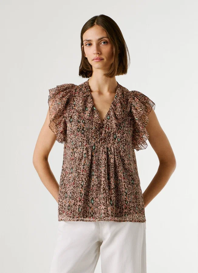 Bluse mit V-Ausschnitt und Rüschen Bluse mit V-Ausschnitt und Rüschen
