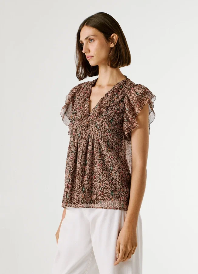 Bluse mit V-Ausschnitt und Rüschen Bluse mit V-Ausschnitt und Rüschen