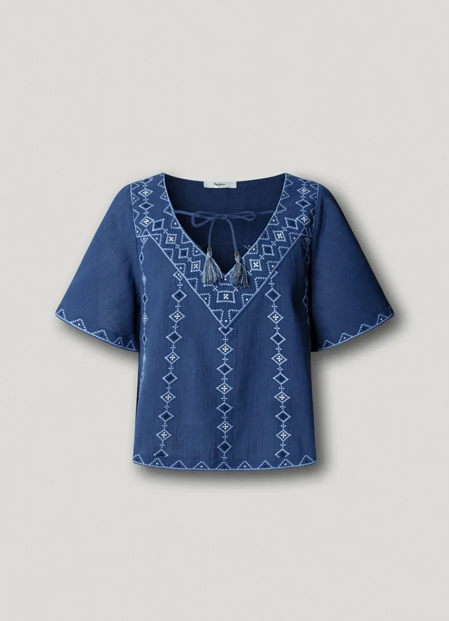 Bluse mit V-Ausschnitt und Stickdetails Bluse mit V-Ausschnitt und Stickdetails