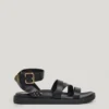 Flache Sandalen mit gekreuzten Riemen