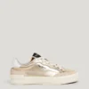 Goldene Sneaker mit Animal-Print-Details