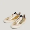 Goldene Sneaker mit Animal-Print-Details