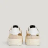 Goldene Sneaker mit Animal-Print-Details