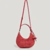 Halbmondförmige Raffia-Handtasche