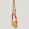 Halbmondförmige Raffia-Handtasche