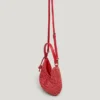 Halbmondförmige Raffia-Handtasche