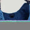 Halbmondförmige Raffia-Handtasche