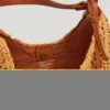 Halbmondförmige Raffia-Handtasche