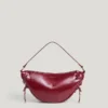 Handtasche in Halbmondform in Lederoptik