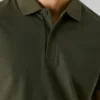 Piqué-Polo mit Aufdruck auf der Rückseite Piqué-Polo mit Aufdruck auf der Rückseite