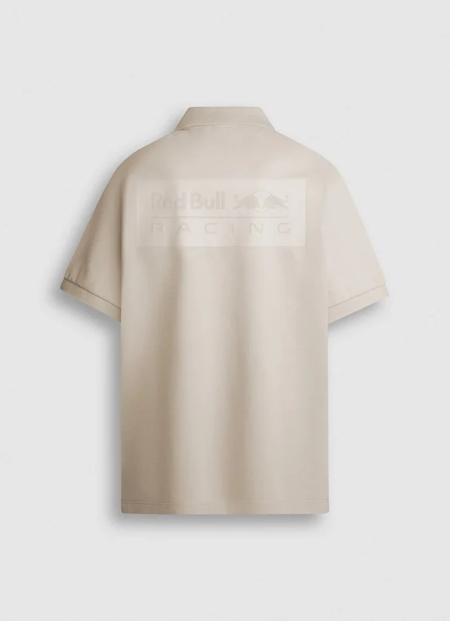 Piqué-Polo mit Aufdruck auf der Rückseite Piqué-Polo mit Aufdruck auf der Rückseite