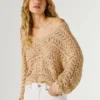 Pullover mit V-Ausschnitt und Ajourmuster Pullover mit V-Ausschnitt und Ajourmuster