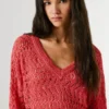 Pullover mit V-Ausschnitt und Ajourmuster Pullover mit V-Ausschnitt und Ajourmuster
