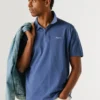Stückgefärbtes Piqué-Poloshirt Stückgefärbtes Piqué-Poloshirt