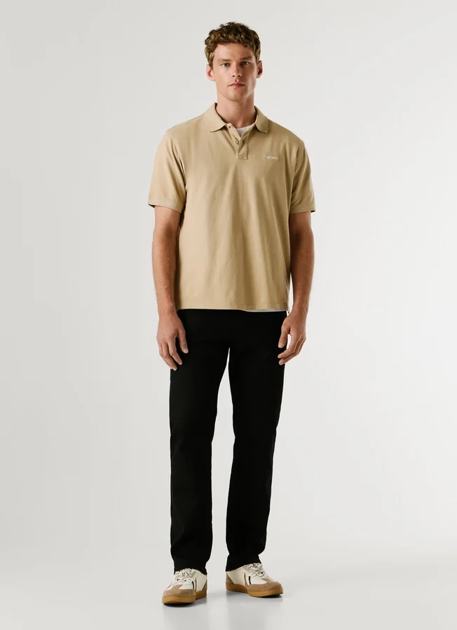 Stückgefärbtes Piqué-Poloshirt Stückgefärbtes Piqué-Poloshirt