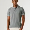 Stückgefärbtes Piqué-Poloshirt Stückgefärbtes Piqué-Poloshirt