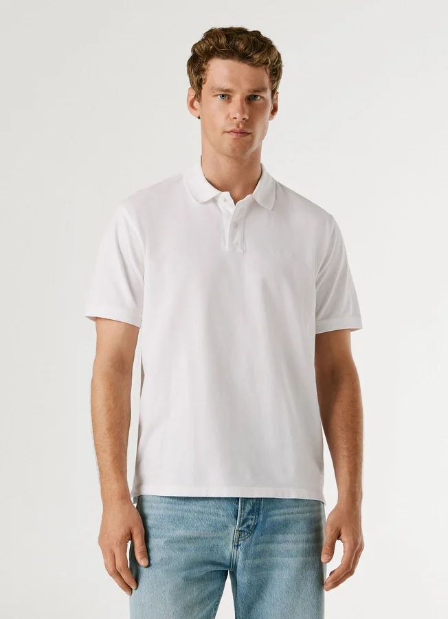 Stückgefärbtes Piqué-Poloshirt Stückgefärbtes Piqué-Poloshirt
