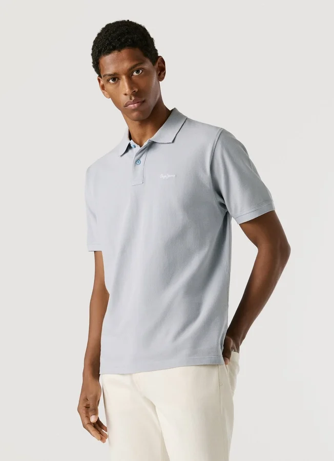 Stückgefärbtes Piqué-Poloshirt Stückgefärbtes Piqué-Poloshirt