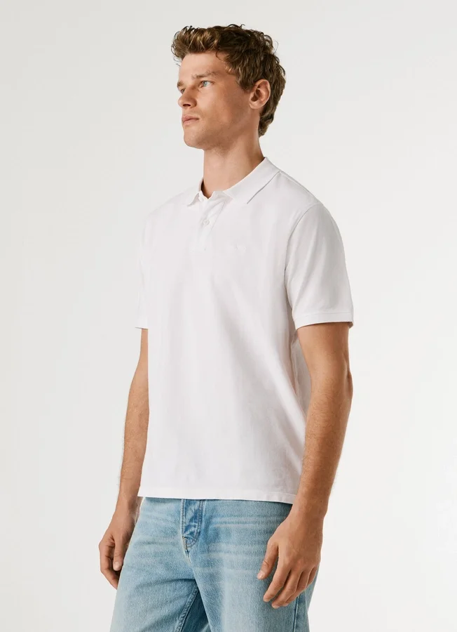 Stückgefärbtes Piqué-Poloshirt Stückgefärbtes Piqué-Poloshirt
