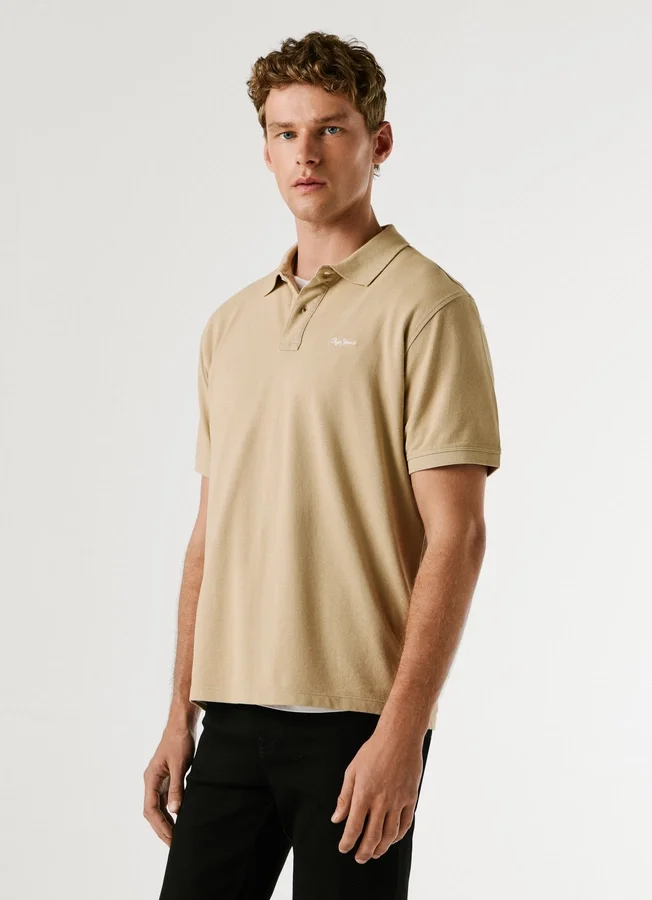 Stückgefärbtes Piqué-Poloshirt Stückgefärbtes Piqué-Poloshirt