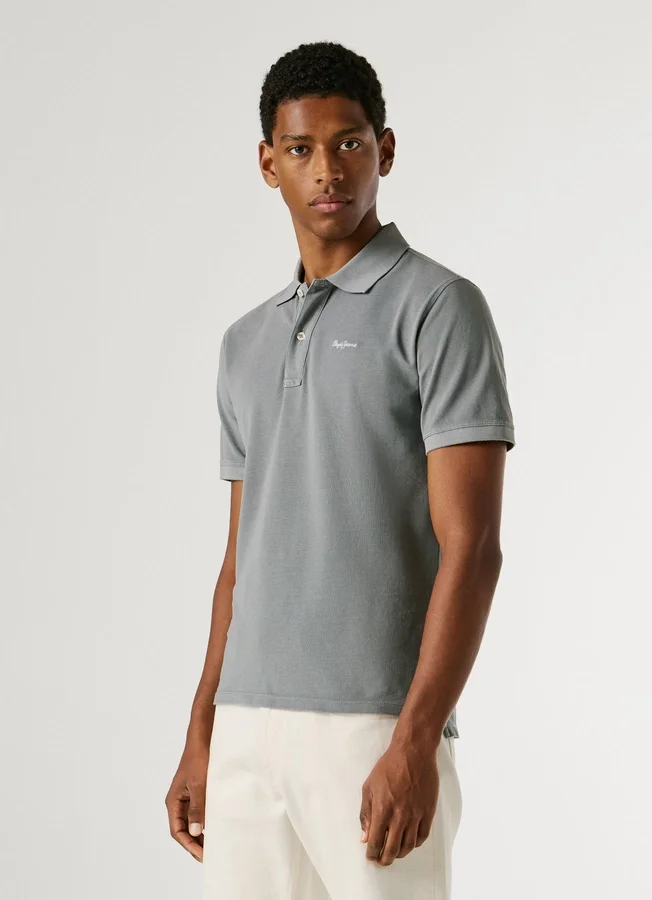 Stückgefärbtes Piqué-Poloshirt Stückgefärbtes Piqué-Poloshirt