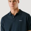 Stückgefärbtes Piqué-Poloshirt Stückgefärbtes Piqué-Poloshirt
