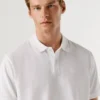 Stückgefärbtes Piqué-Poloshirt Stückgefärbtes Piqué-Poloshirt