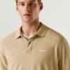 Stückgefärbtes Piqué-Poloshirt Stückgefärbtes Piqué-Poloshirt