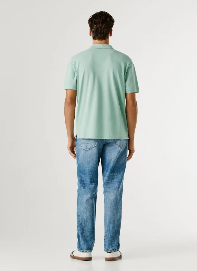 Stückgefärbtes Piqué-Poloshirt Stückgefärbtes Piqué-Poloshirt