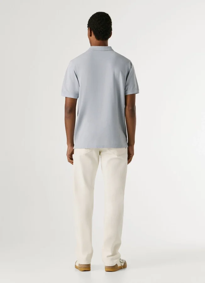 Stückgefärbtes Piqué-Poloshirt Stückgefärbtes Piqué-Poloshirt