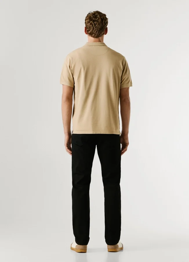 Stückgefärbtes Piqué-Poloshirt Stückgefärbtes Piqué-Poloshirt