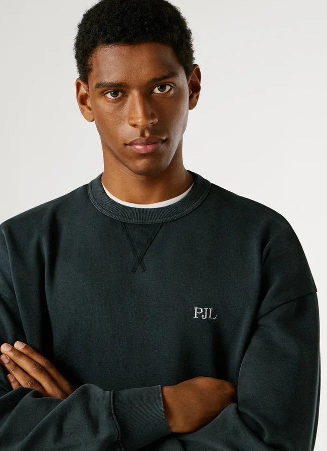 Sweatshirt mit Rundhalsausschnitt und lockerer Passform Sweatshirt mit Rundhalsausschnitt und lockerer Passform