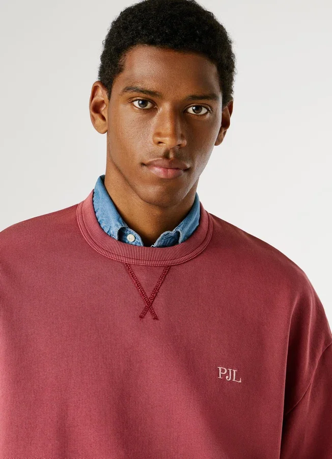 Sweatshirt mit Rundhalsausschnitt und lockerer Passform Sweatshirt mit Rundhalsausschnitt und lockerer Passform