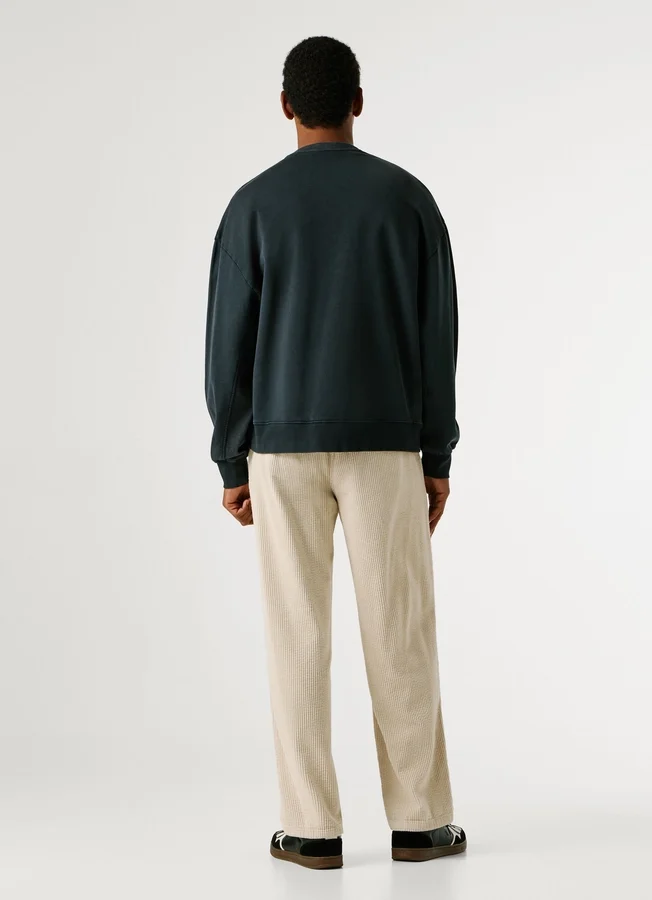 Sweatshirt mit Rundhalsausschnitt und lockerer Passform Sweatshirt mit Rundhalsausschnitt und lockerer Passform