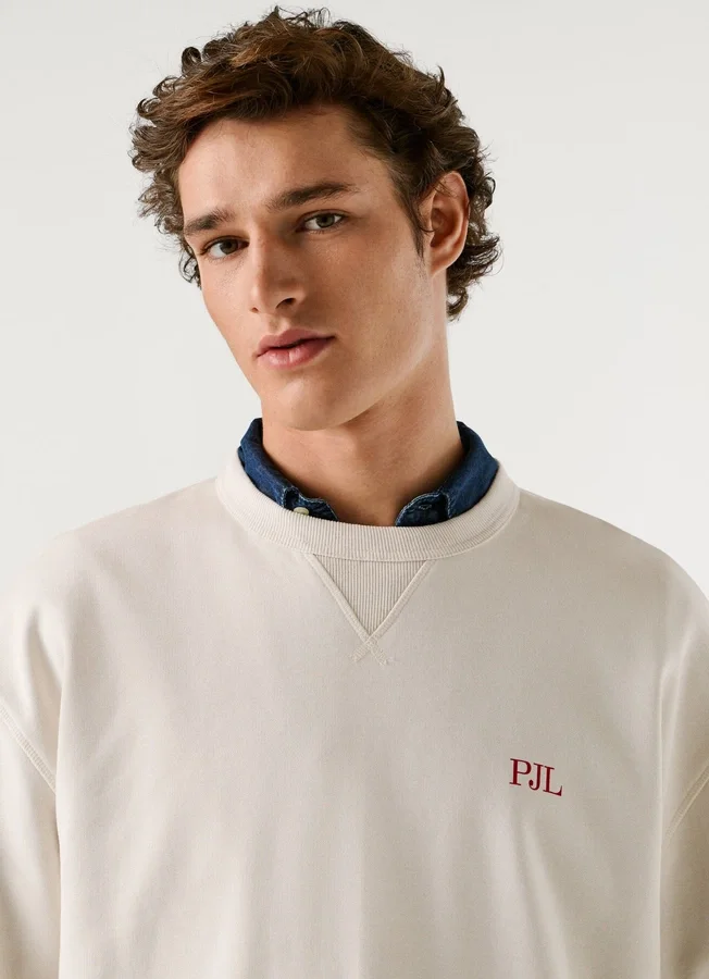 Sweatshirt mit Rundhalsausschnitt und lockerer Passform Sweatshirt mit Rundhalsausschnitt und lockerer Passform