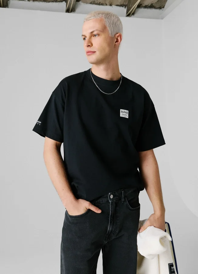 T-Shirt mit Rückenaufdruck und lockerer Passform T-Shirt mit Rückenaufdruck und lockerer Passform