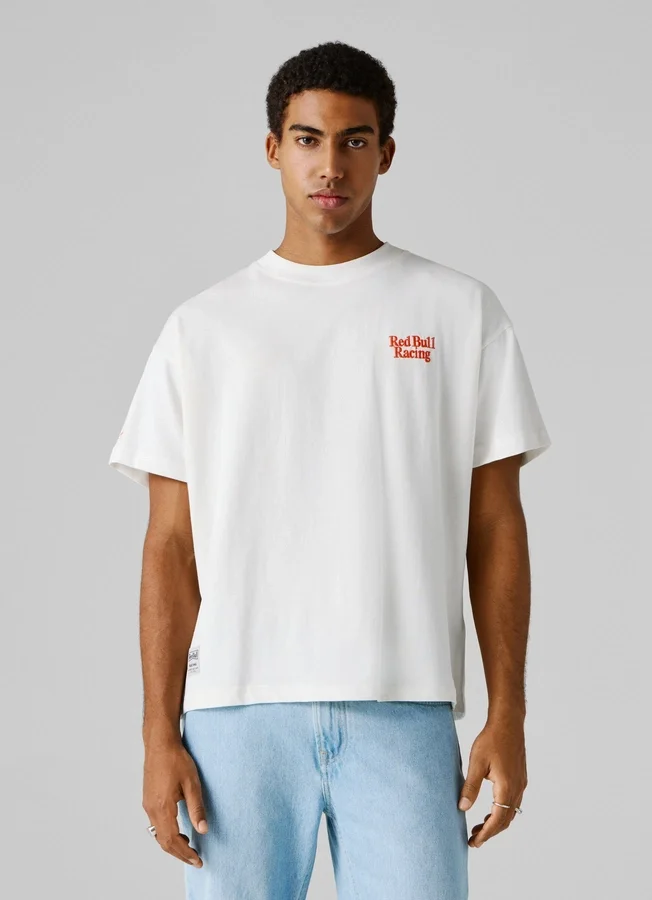 T-Shirt mit Rückenaufdruck und lockerer Passform T-Shirt mit Rückenaufdruck und lockerer Passform