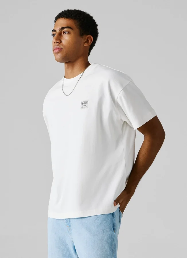 T-Shirt mit Rückenaufdruck und lockerer Passform T-Shirt mit Rückenaufdruck und lockerer Passform