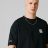 T-Shirt mit Rückenaufdruck und lockerer Passform T-Shirt mit Rückenaufdruck und lockerer Passform