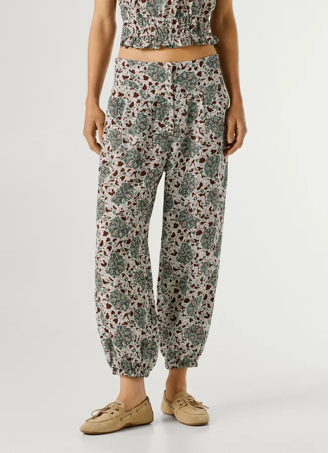 Weit geschnittene Hose mit Blumenmuster Weit geschnittene Hose mit Blumenmuster