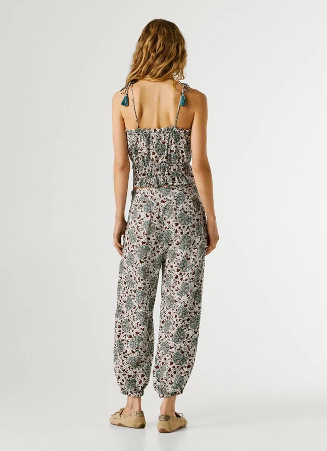 Weit geschnittene Hose mit Blumenmuster Weit geschnittene Hose mit Blumenmuster